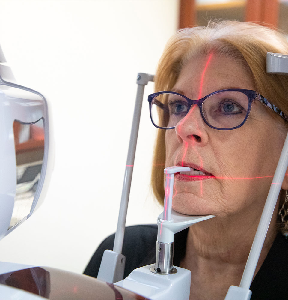 Patient taking a dental x-ray